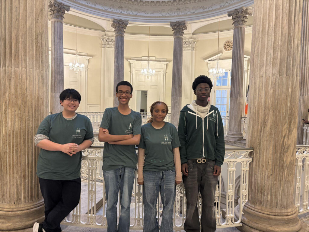 Four Fellows post at City Hall